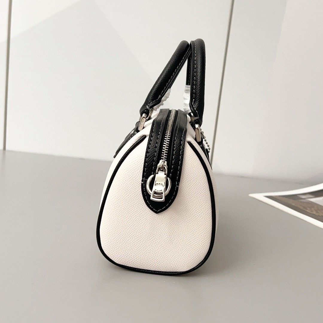COACH C0958 Mini Line Boston Pack – Chic, Compact &amp; Modern